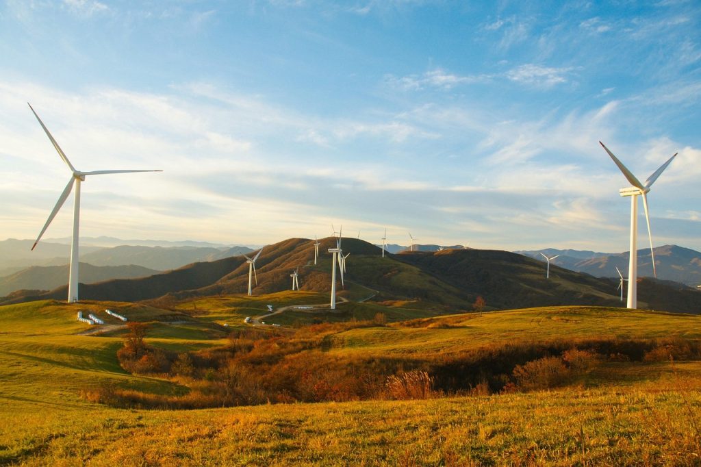 A range of hills with wind turbines